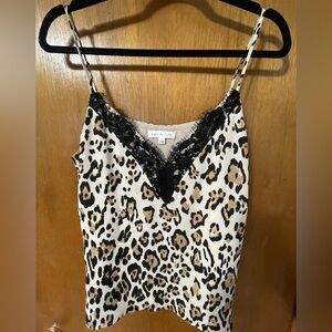 Leopard print cami with black lace trim on bustline